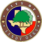 Seal of the City of Sandy Oaks with a tree and Texas map.